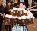 German-woman-carrying-loads-of-beer1.jpg